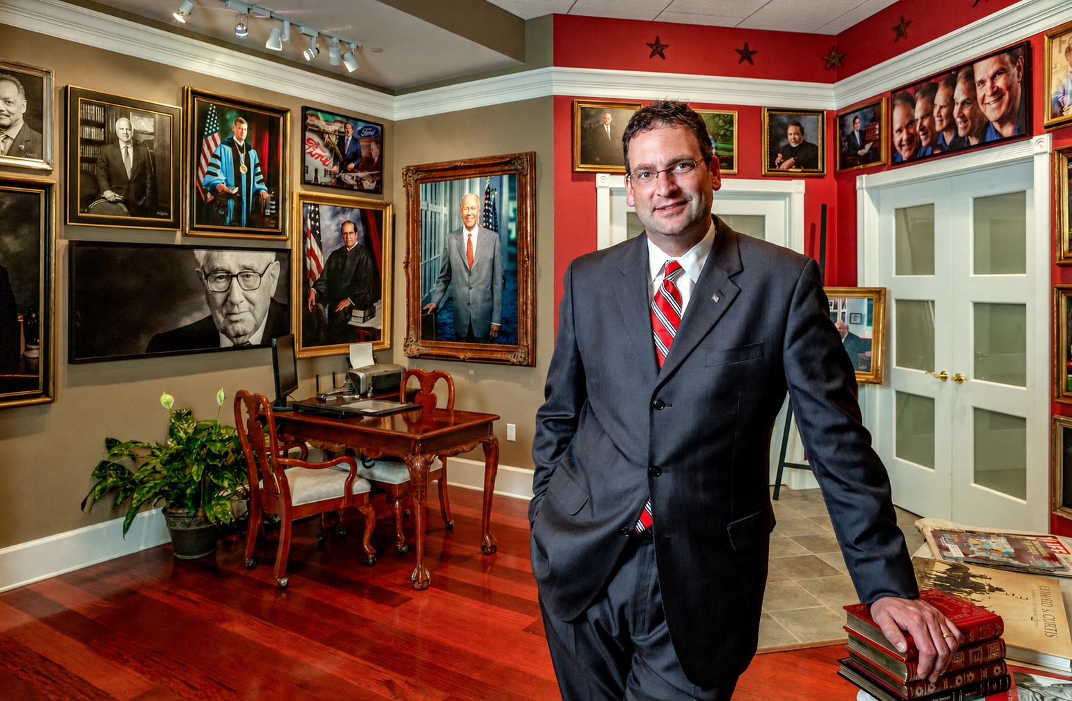 David DeJonge in his portrait studio at the Amway Grand Plaza Hotel